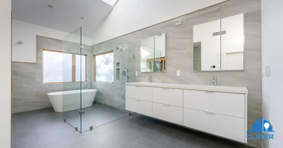 Master bathroom with a freestanding tub, glass shower and floating double vanity