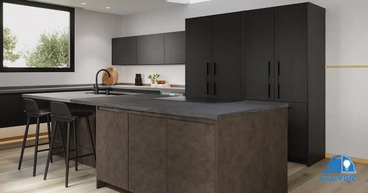 Dark island and tall pantry cabinets in the redesigned kitchen