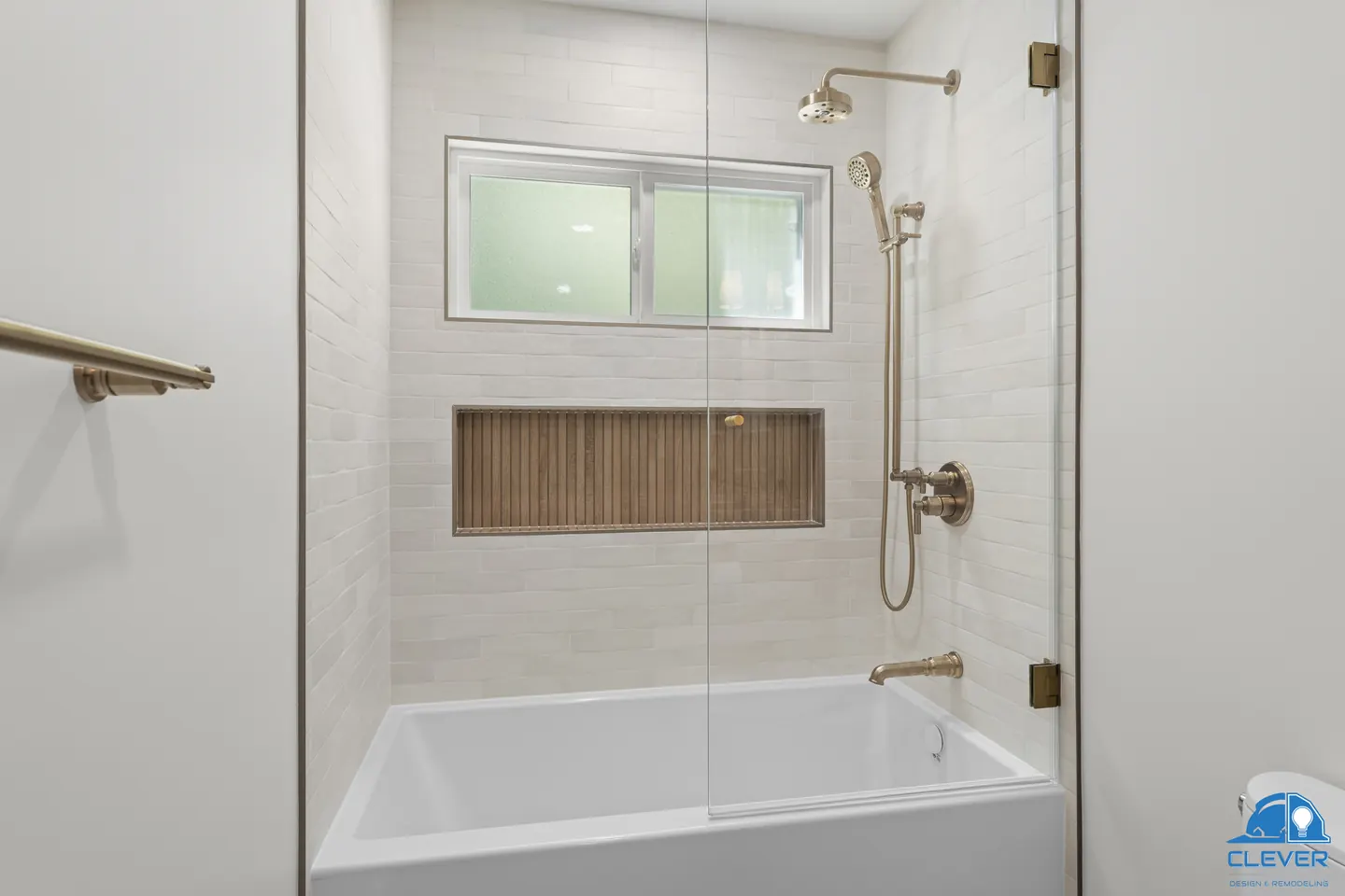 Tub-shower with a glass panel, a long wood-look tile niche and brass fixtures, kitchen and bath remodel in Redwood City, CA